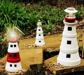 s 13 spectacular things to make for your yard using 1 solar lights, lighting, outdoor living, repurposing upcycling, These adorable terra cotta lighthouses