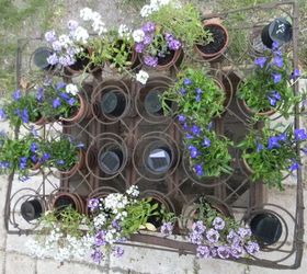 s 13 spectacular things to make for your yard using 1 solar lights, lighting, outdoor living, repurposing upcycling, This illuminated flower bed from bed springs