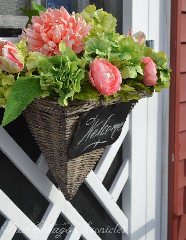 como hacer una cesta de flores para la puerta de entrada