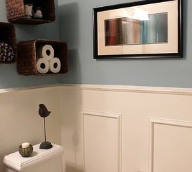 13 tricks people who hate bathroom clutter swear by, Get easy shelves by putting baskets on a wall