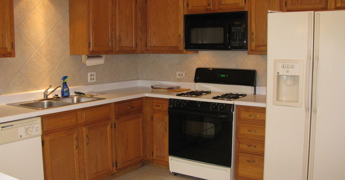 Best way to spruce up finish on medium oak Kitchen