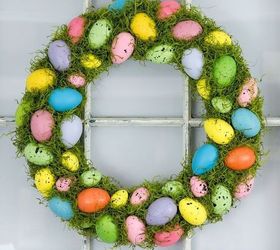 s 31 gorgeous spring wreaths that will make your neighbors smile, crafts, seasonal holiday decor, wreaths, Fill a wreath with colorful eggs