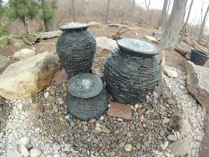 multiple bubbling urn fountain feature with pondless waterfall