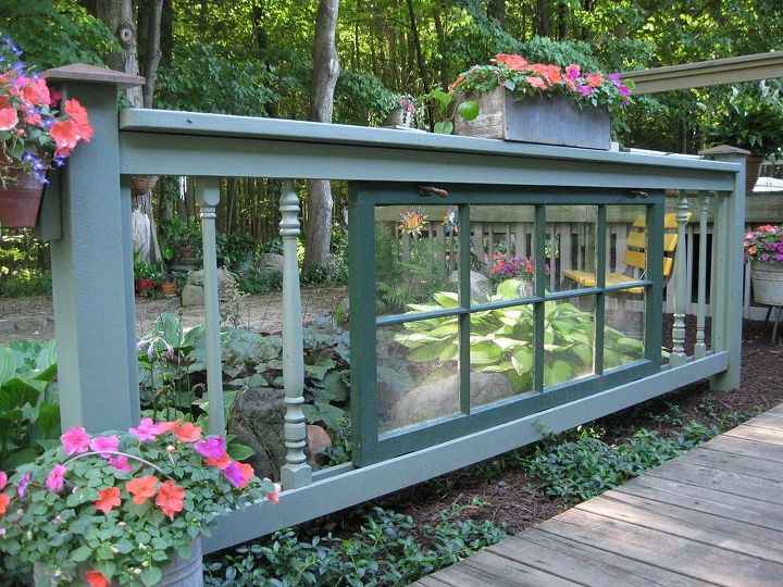 15 privacy fences that will turn your yard into a secluded oasis, Upcycle a window in your fence