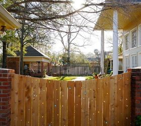 15 privacy fences that will turn your yard into a secluded oasis, Drill holes in a plain fence to add marbles
