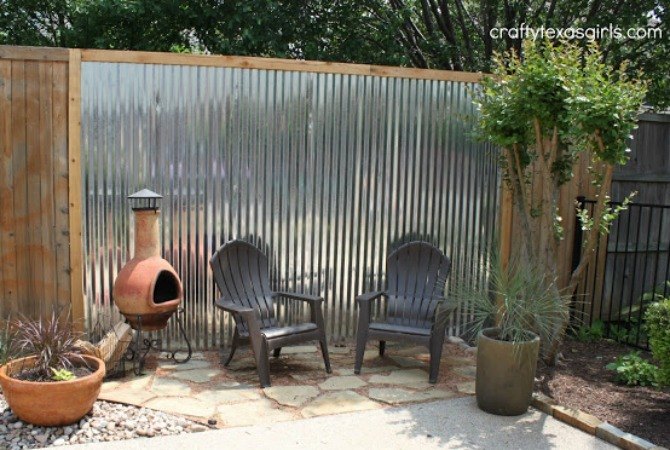 15 privacy fences that will turn your yard into a secluded oasis, Make an outdoor accent wall from tin
