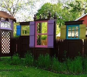 15 privacy fences that will turn your yard into a secluded oasis, Create a fun design with doors windows
