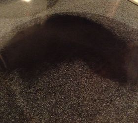 Stains under the glass of a smooth top stove