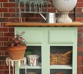 s these are the hottest diy spring trends of 2016, crafts, seasonal holiday decor, Display stacks of pots near the garden