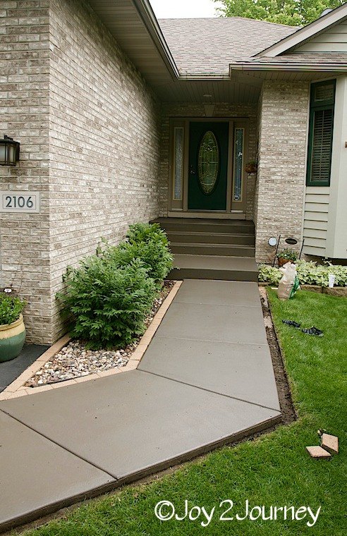 s 11 quick and easy curb appeal ideas that make a huge impact, curb appeal, Restain a dried out concrete walkway