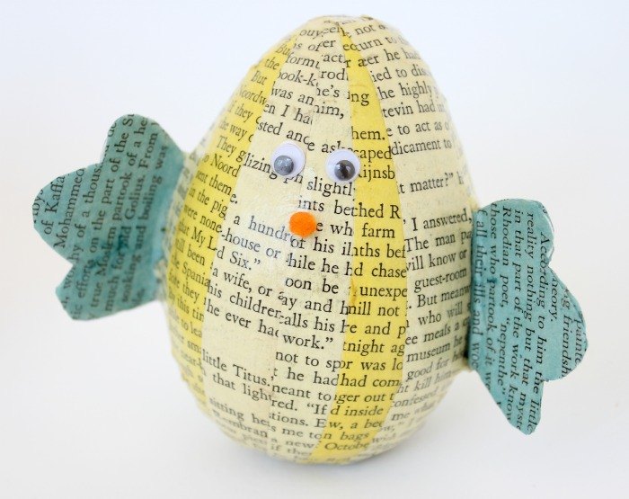 25 quick easter egg ideas that are just too stinkin cute, Wrap eggs in book pages craft chicks