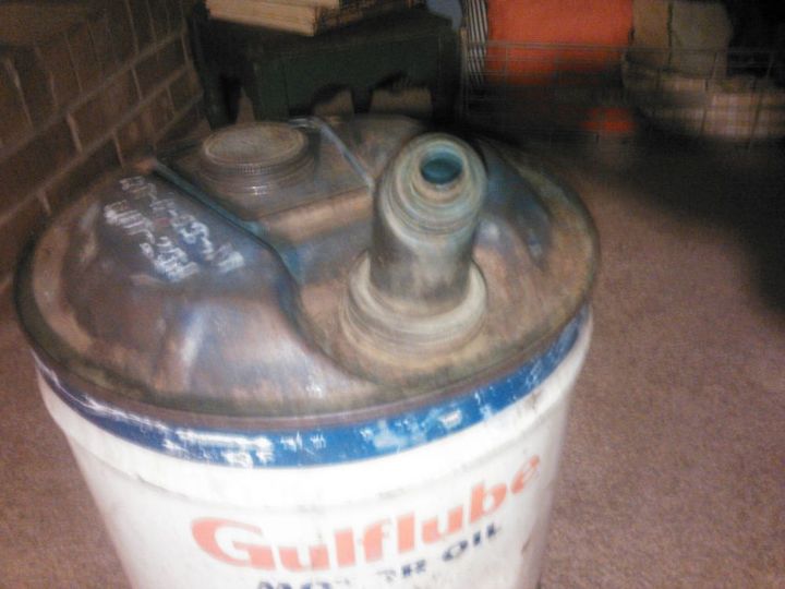 repurposed gulf oil canister, lighting, repurposing upcycling, Removed the smallest of the spouts it