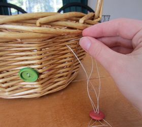 diy button easter basket, crafts, easter decorations, seasonal holiday decor, Sewing the buttons to the basket
