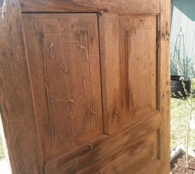 new life for an old farm door, doors, gardening, outdoor living, repurposing upcycling, Backside beautiful wood underneath the webs