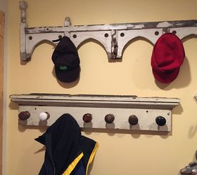 turning a dull mudroom into a bit of victorian whimsey, foyer, repurposing upcycling, storage ideas, wall decor, Salvaged Victorian trim pegs now a hatrack