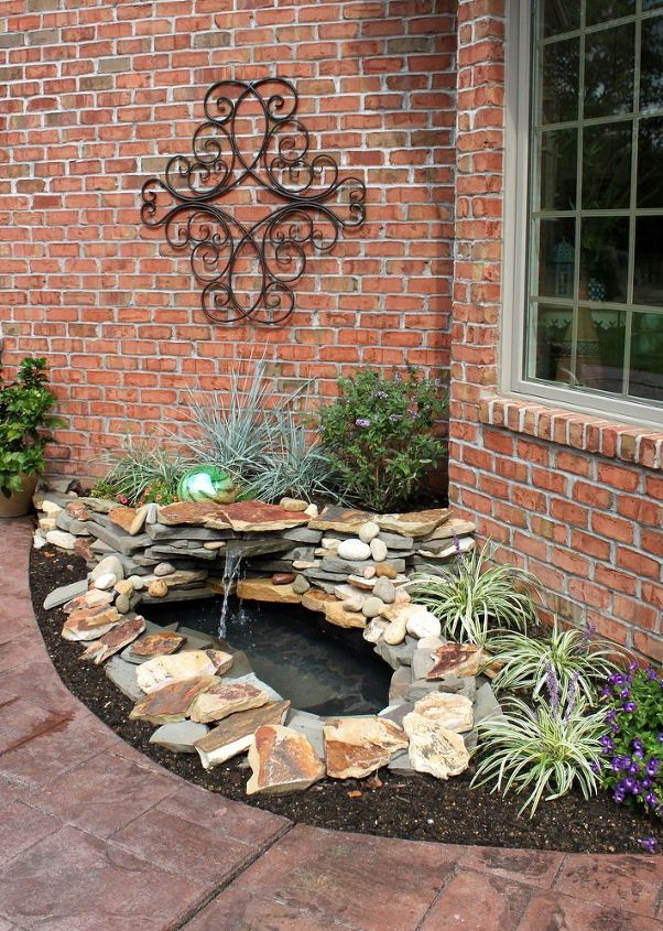 10 mini water features to add zen to your garden, Put a tiny waterfall pond beside your door