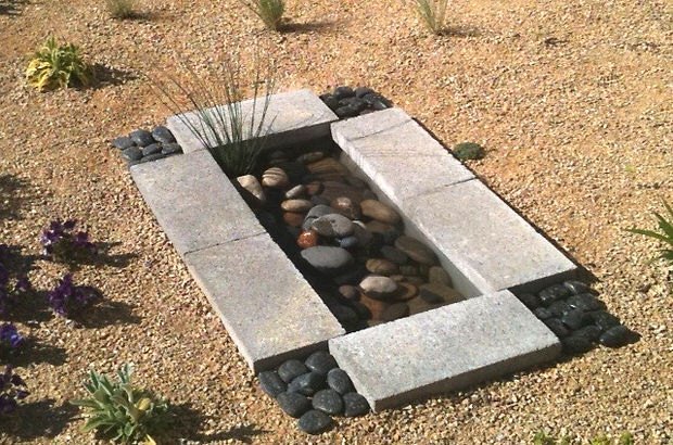 10 mini water features to add zen to your garden, Turn a large plastic bin into a mini pond