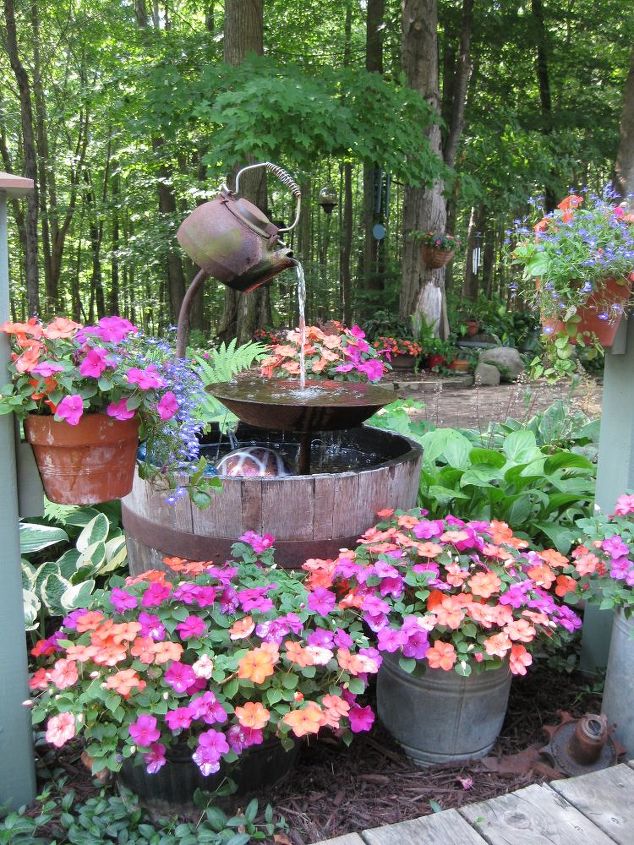 10 mini water features to add zen to your garden, Upcycle a teapot into a rustic fountain