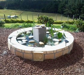 10 mini water features to add zen to your garden, Flip an old hot tub into a plant pond