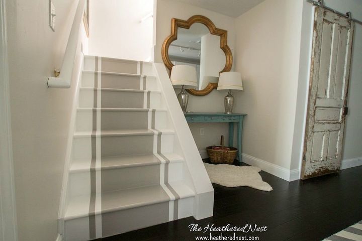 15 bold ways to redo your outdated staircase without remodeling, Go French chic with a striped border