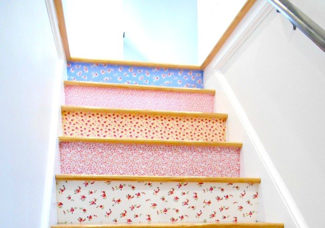 15 bold ways to redo your outdated staircase without remodeling, Stick strips of fun fabric over the risers