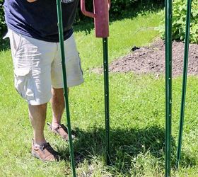 diy potato tower, gardening, homesteading, how to, Pounding posts into the ground