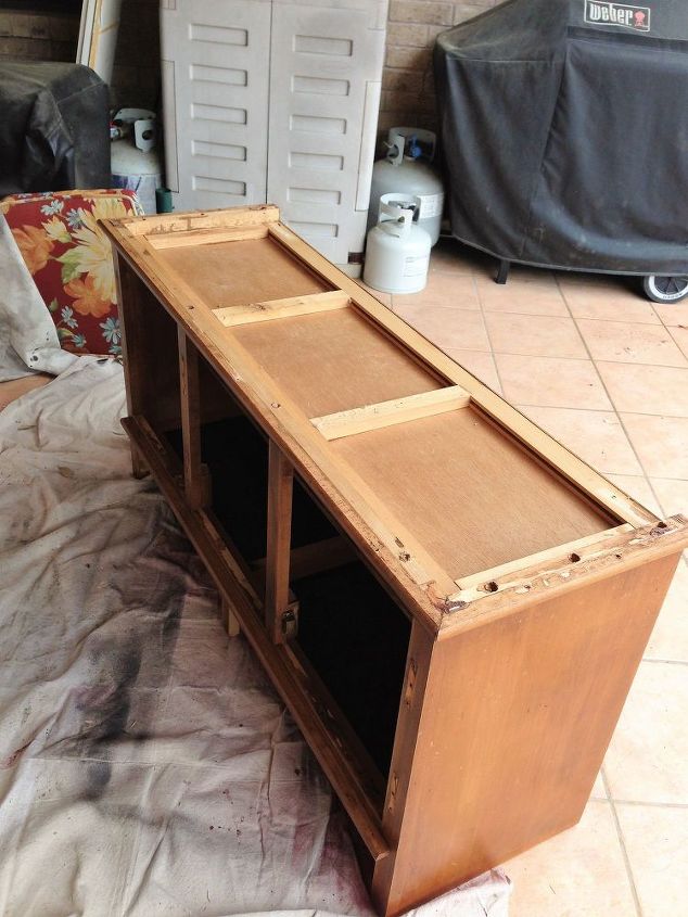 china hutch repurposed into a flat screen tv stand, Upside down legs need to be added