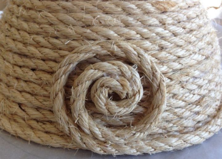 cesta de cuerda de sisal enrollada con tapa