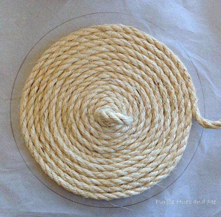 cesta de cuerda de sisal enrollada con tapa
