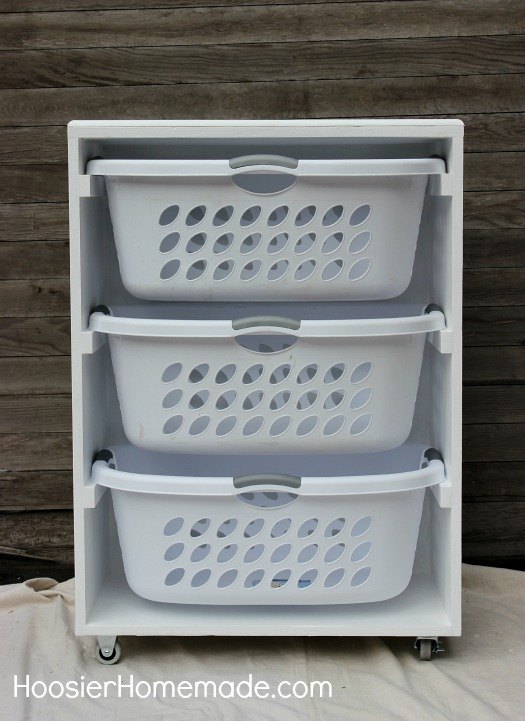 s 11 easy updates that will make you love your laundry room, laundry rooms, Build a mobile laundry basket station