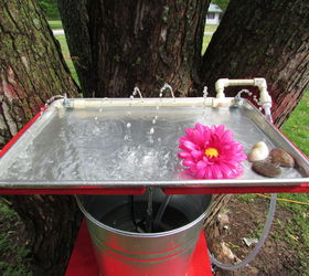 making a hummingbird water and bathing tray out of a cookie sheet
