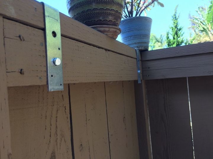 hiding an ugly shed that houses pool equipment