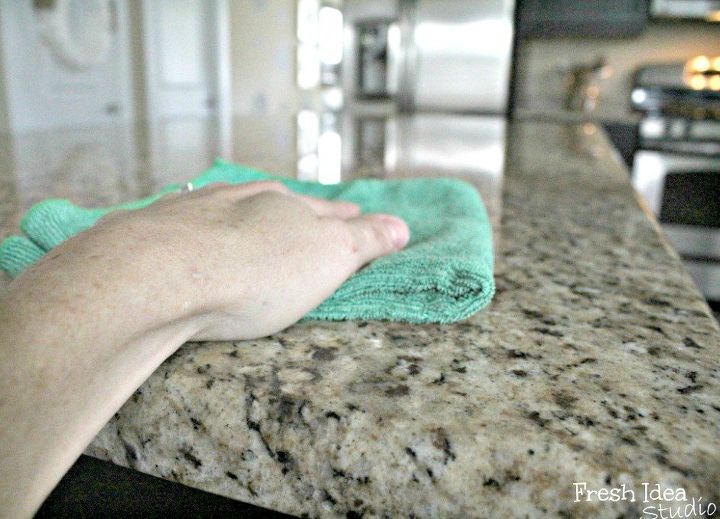 s how to keep dirty kitchen spots clean and fresh much longer, cleaning tips, kitchen design, Rub Armor All over granite countertops
