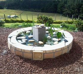 s 15 budget outdoor updates to turn your yard into a relaxing getaway, outdoor furniture, outdoor living, Turn an old spa into a high end fish pond