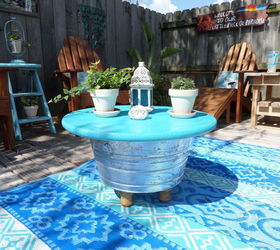 s 15 budget outdoor updates to turn your yard into a relaxing getaway, outdoor furniture, outdoor living, Make a coffee table fire pit with a bucket