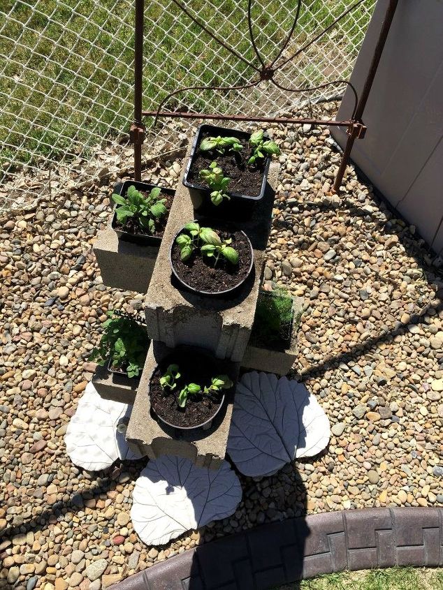 10 genius ways to use cinder blocks in your garden, Stack a few into a handy herb planter
