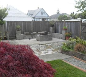 10 genius ways to use cinder blocks in your garden, Use blocks to make an entire fire pit corner
