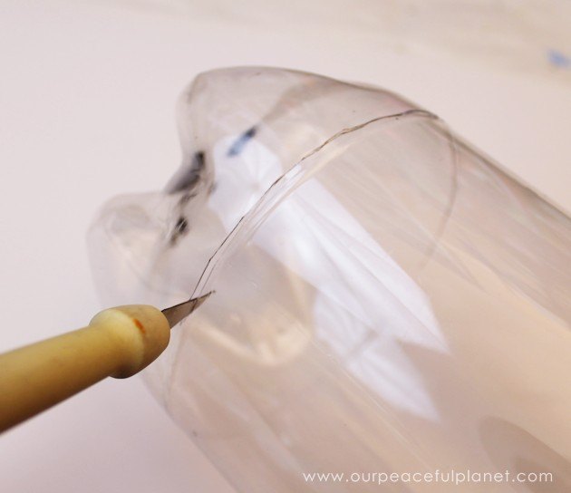 plastic bag dispenser from a soda bottle cd crafts organizing repurposing upcycling