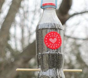 s 17 adorable birdfeeders using things you already own, outdoor living, repurposing upcycling, Poke holes in an empty soda bottle