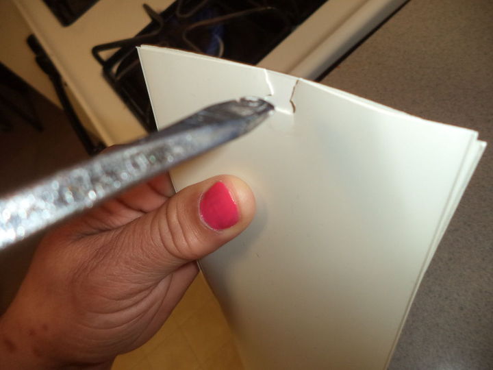 how to temporary repair your vertical blinds with a flat head screwdri