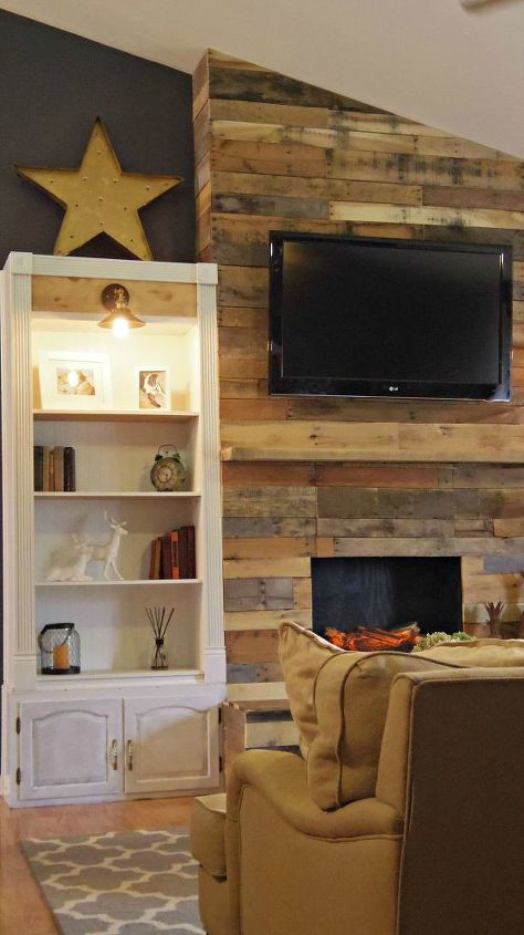 12 simple tricks to amp up the light for your dark fireplace, Cover a dark surface with light pallet planks