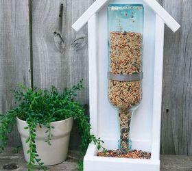 15 incredible backyard ideas using empty wine bottles, Use an extra bottle to feed the birds
