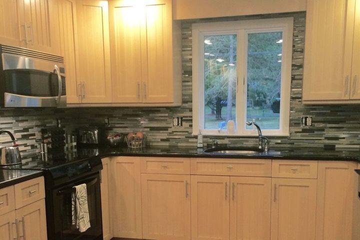 s 11 updates to let your husband know you want before mother s day, home improvement, home maintenance repairs, seasonal holiday decor, A shiny new tiled kitchen backsplash