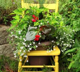 15 whimsical ways to use old furniture in your flower bed, Set a tall planter in a hollow chair center