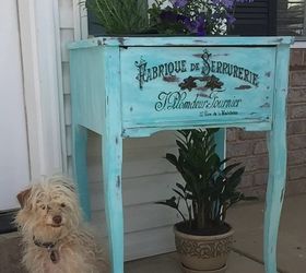 15 whimsical ways to use old furniture in your flower bed, Insert a planter inside an old sewing cabinet