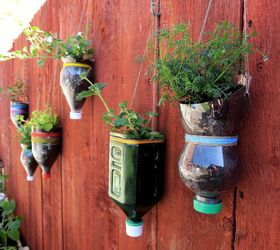 upcycled bottle planters, container gardening, gardening, repurposing upcycling, wall decor