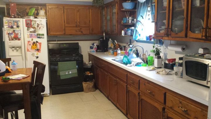 q i have a very small l shaped cluttered kitchen , kitchen design