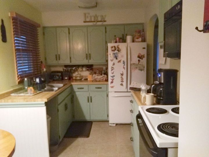 remodelacion de la cocina con gabinetes grises