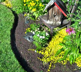 s 11 quick tricks to whip your home exterior into shape, curb appeal, home decor, Define your flower beds with clean edging
