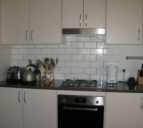 updating my kitchen tiles for fifteen dollars, diy, how to, kitchen backsplash, kitchen design, tiling, Partially done see the white grout still